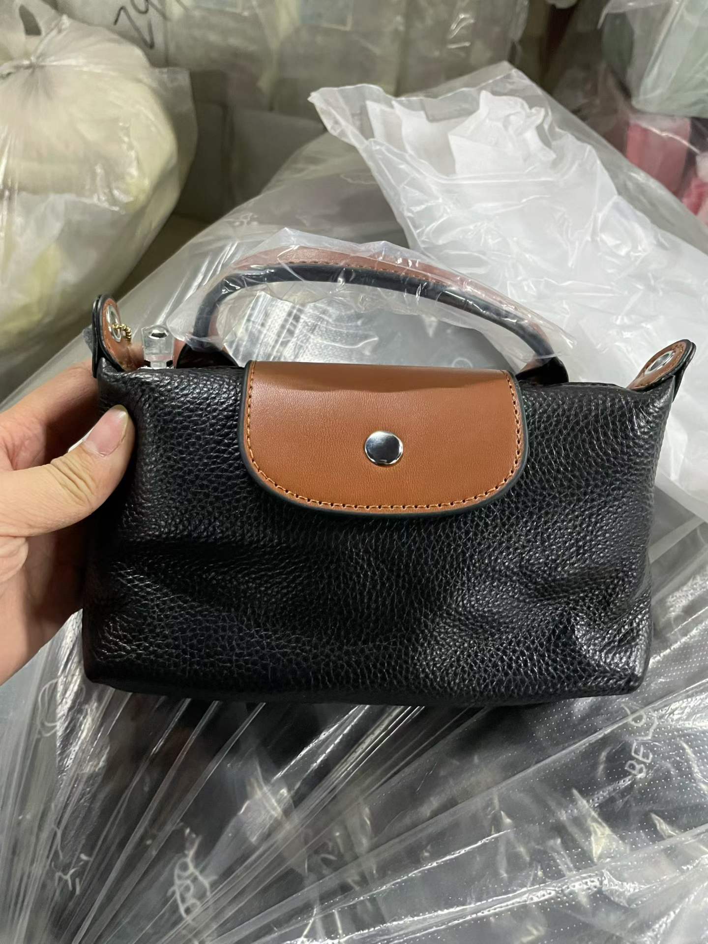 真皮女包100多个